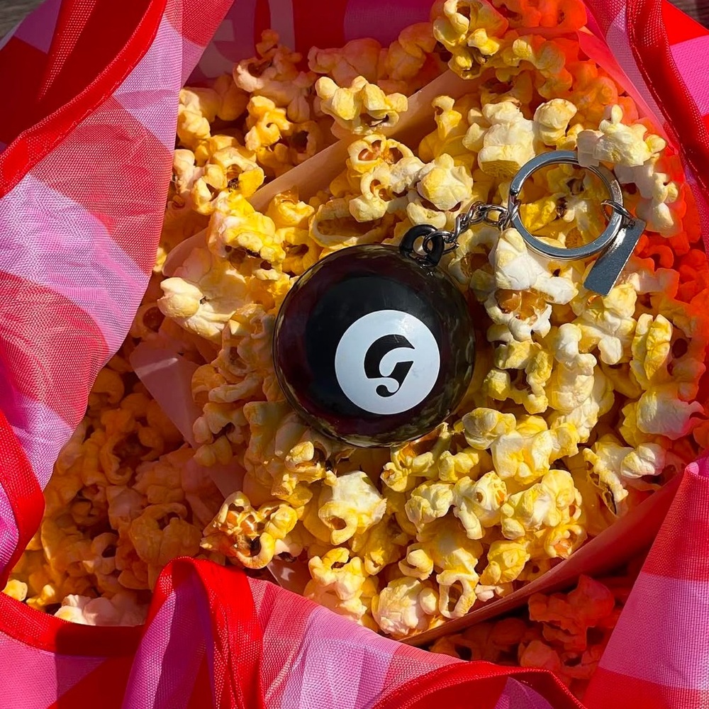 glossier magic 8 ball keychain